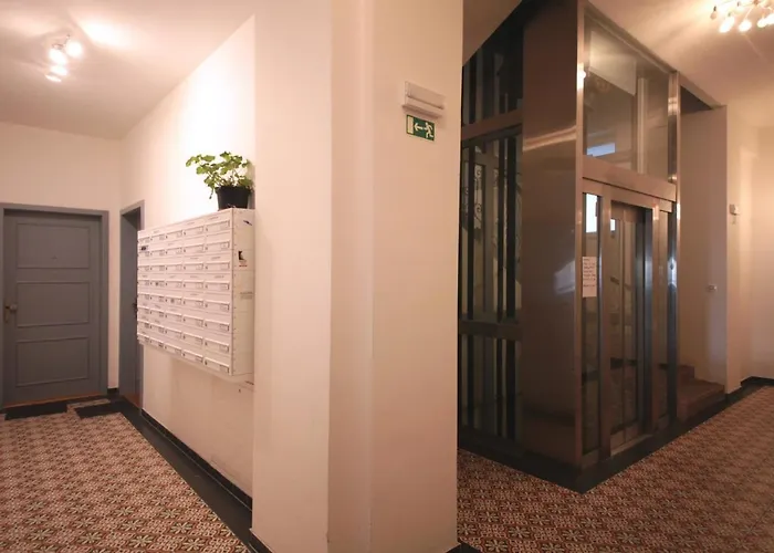 Modern Futuristic Apartment / Zizkov Tv Tower + Metro Station